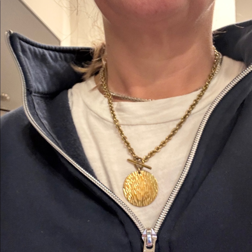 Cool gold necklace. Chain measures 18 in in length